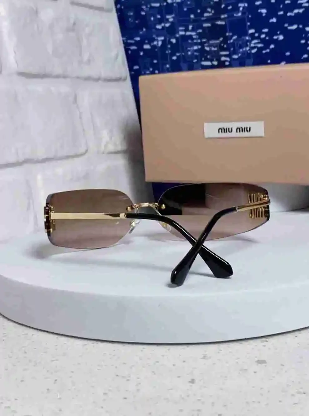 Miu Miu Rimless Gradient Brown Lens Gold Logo Sunglasses